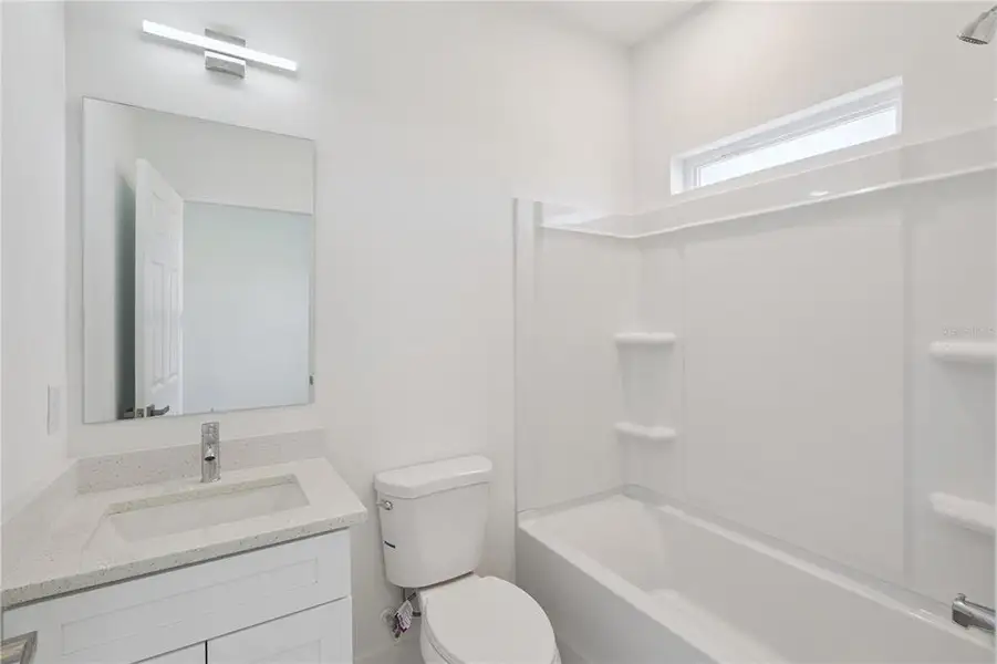 Furnished interior view inside a new home in , Kissimmee (Image 8).