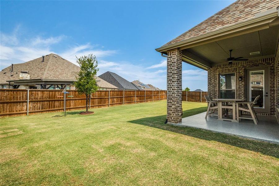 Exterior details and patio area of a home in , Flower Mound (Image 20).