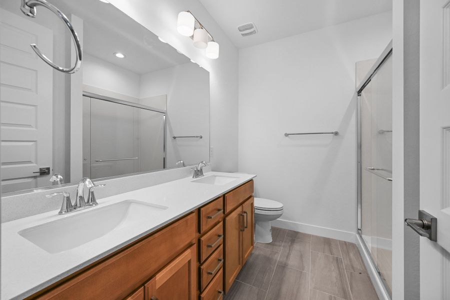 Representative furnished interior of a home built from the Caliber by Taylor Morrison in Artisan at Asante, Surprise (Image 14). Representative furnished interior of a home built from the Caliber by Taylor Morrison in Artisan at Asante, Surprise (Image 14).