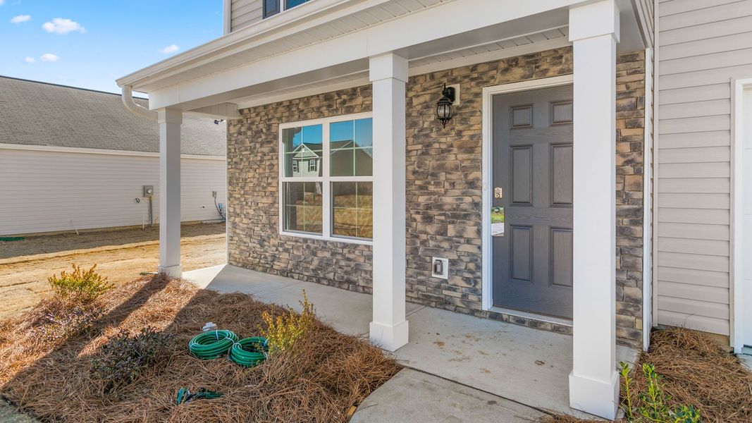 Exterior details and patio area of a home in Quail Haven, Winston-Salem (Image 2).
