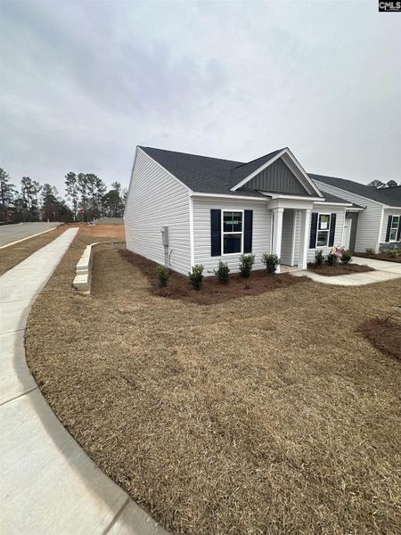 Exterior details and patio area of a home in Piney Woods Bluff, Columbia (Image 1). Exterior details and patio area of a home in Piney Woods Bluff, Columbia (Image 1).