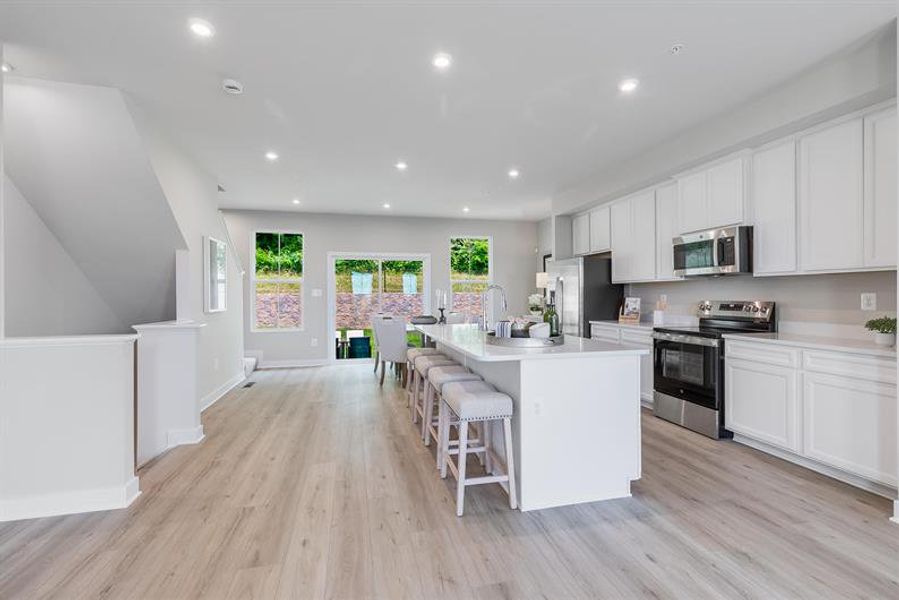 Representative furnished interior of a home built from the Overture by Ryan Homes in Moore Farm Townhomes, Indian Trail (Image 17).