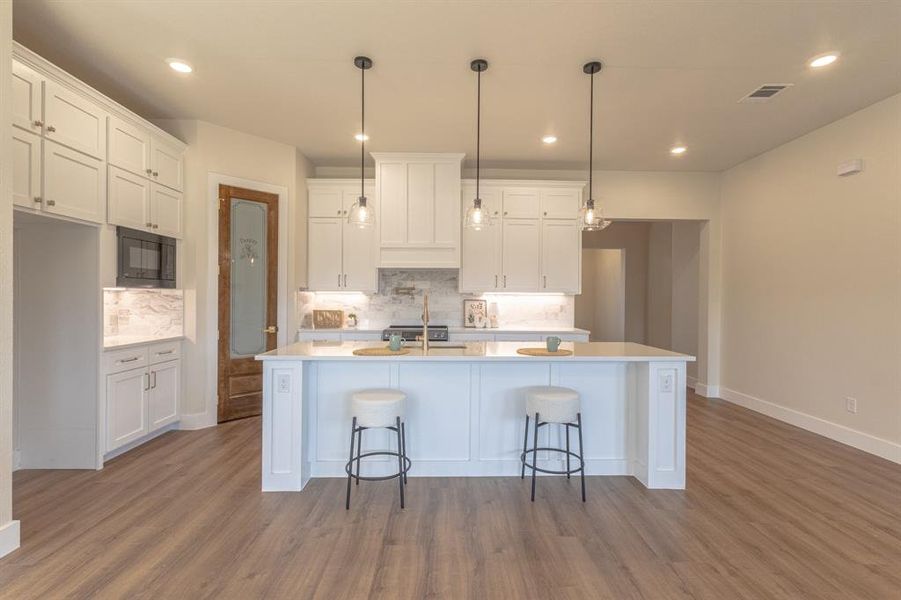 Furnished interior view inside a new home in , River Oaks (Image 8). Furnished interior view inside a new home in , River Oaks (Image 8).