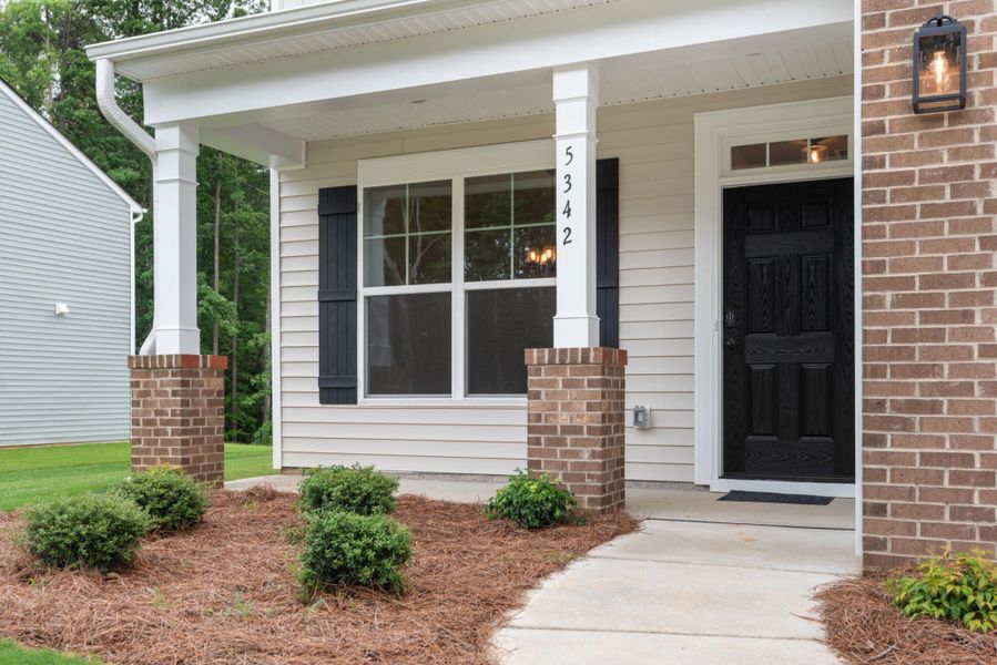 Exterior details and patio area of a home in Chandler Ridge, McLeansville (Image 2). Exterior details and patio area of a home in Chandler Ridge, McLeansville (Image 2).