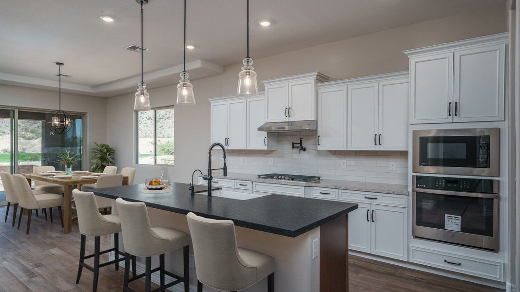 Representative furnished interior of a home built from the Sawgrass II by William Ryan Homes in Fairways in Victory at Verrado, Buckeye (Image 8).