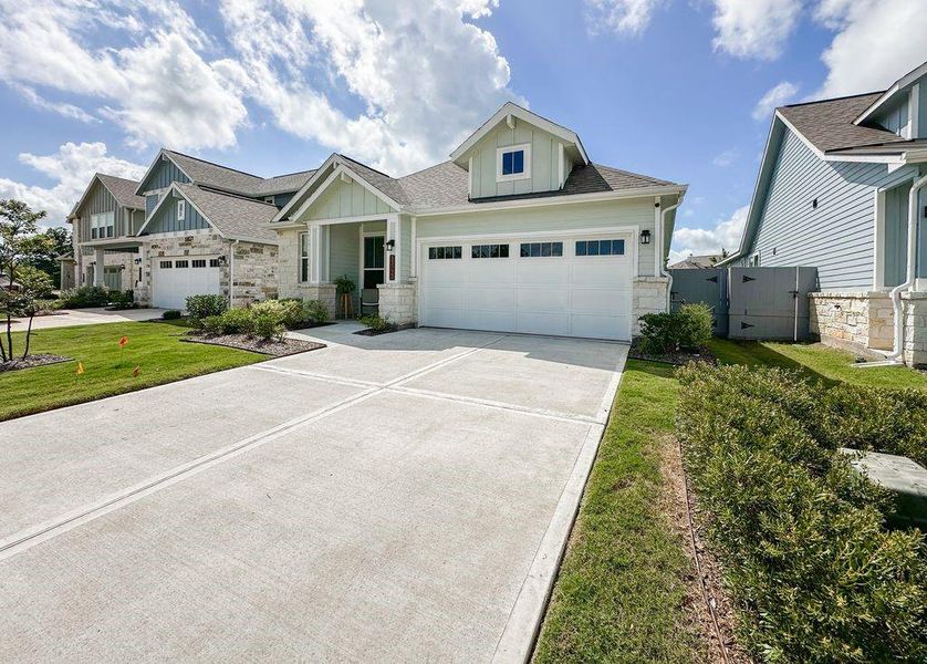 Front exterior of a new home in , Fulshear, TX, highlighting curb appeal (Image 27). Front exterior of a new home in , Fulshear, TX, highlighting curb appeal (Image 27).