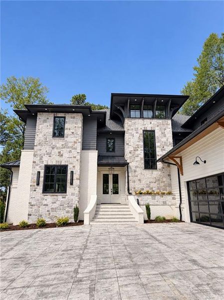 Front exterior of a new home in , Milton, GA, highlighting curb appeal (Image 2). Front exterior of a new home in , Milton, GA, highlighting curb appeal (Image 2).