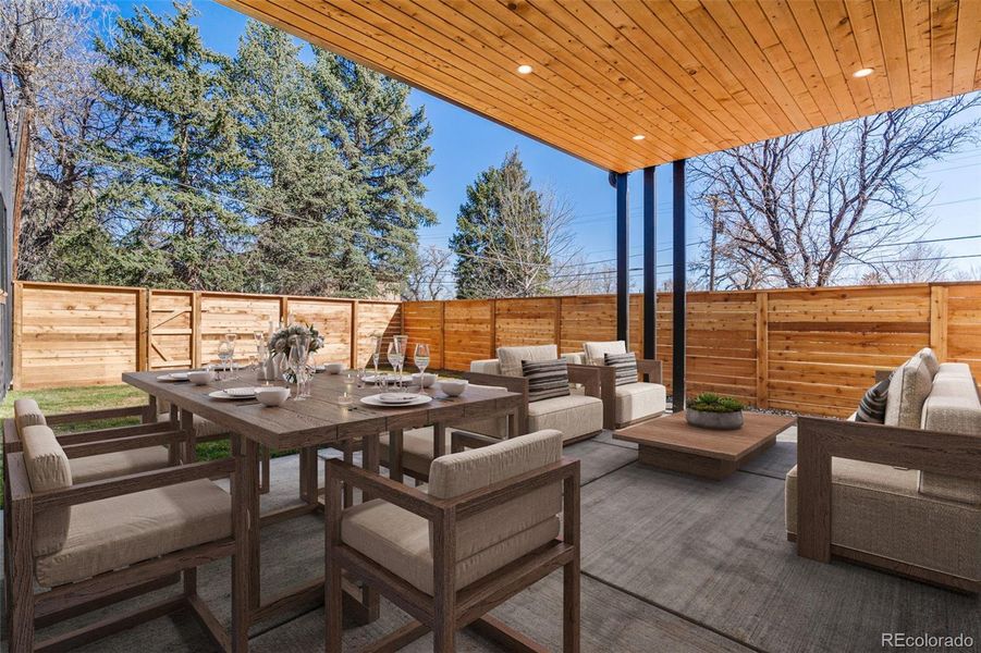 Expanded outdoor living space - covered patio with gas hook-up and fenced yard.Virtually staged.