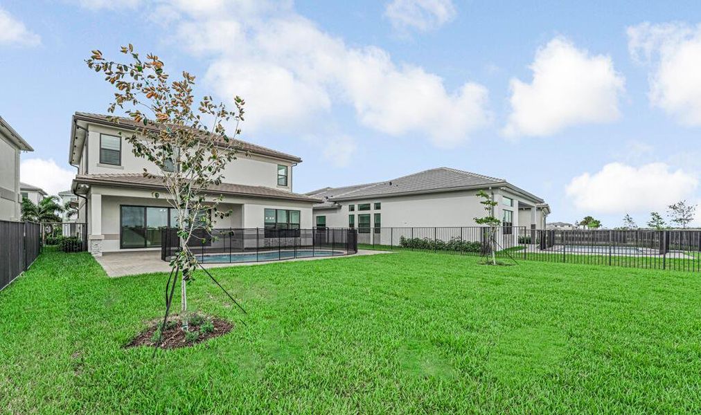 Exterior details and patio area of a home in Apex at Avenir, Palm Beach Gardens (Image 37).