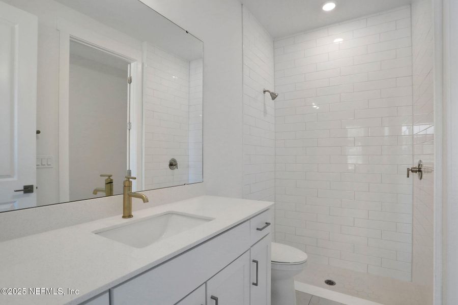 Furnished interior view inside a new home in North Beach Townhomes, Jacksonville Beach (Image 6).