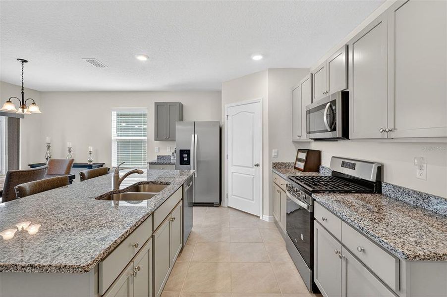 Furnished interior view inside a new home in , Okahumpka (Image 12).