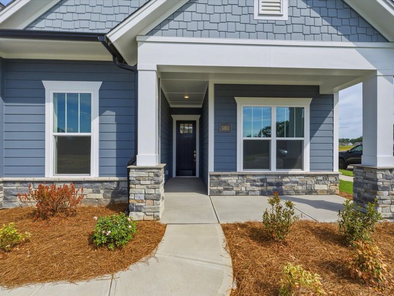 Exterior details and patio area of a home in Encore at Streamside - Tradition Series, Waxhaw (Image 4).