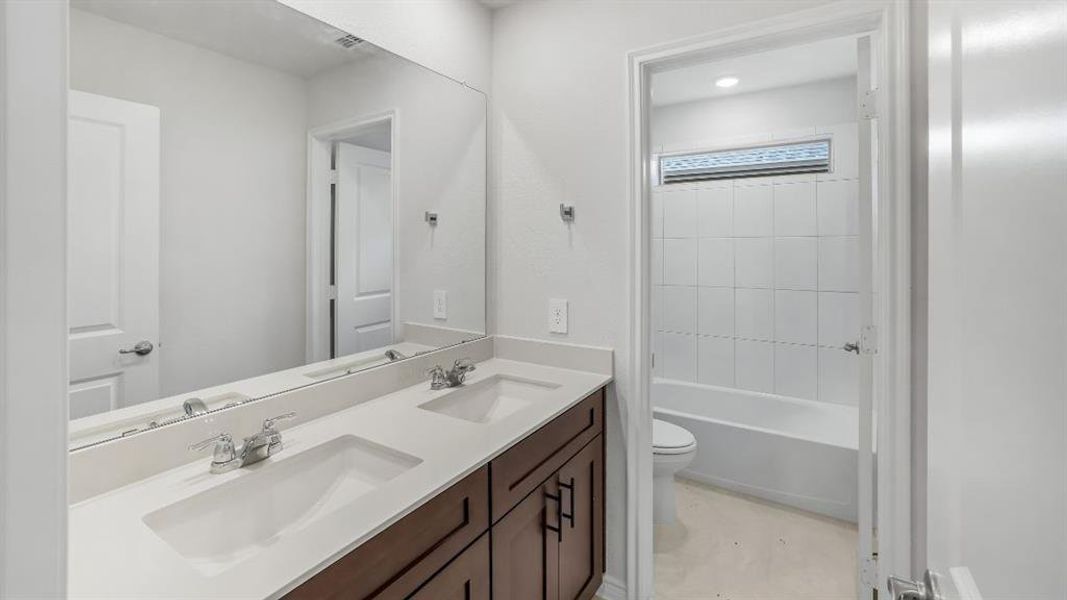 Furnished interior view inside a new home in The Landing at Hidden Lakes, McKinney (Image 8). Furnished interior view inside a new home in The Landing at Hidden Lakes, McKinney (Image 8).