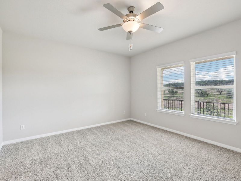 Spacious, unfurnished interior of a new home in Big Sky Ranch - Reserve Collection, Dripping Springs (Image 9).