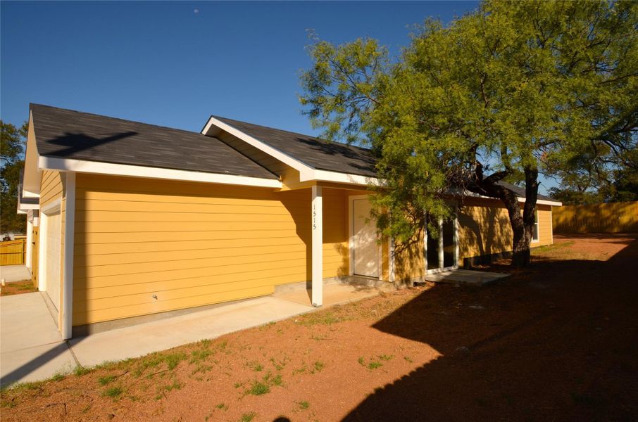 Exterior details and patio area of a home in , Kingsland (Image 2). Exterior details and patio area of a home in , Kingsland (Image 2).
