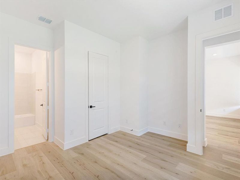 Spacious, unfurnished interior of a new home in Royal Court, Little Elm (Image 15).