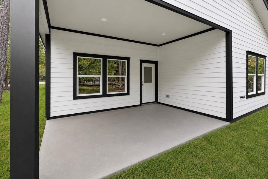 Exterior details and patio area of a home in , Coldspring (Image 3). Exterior details and patio area of a home in , Coldspring (Image 3).