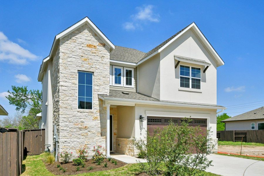 Front exterior of a new home in Cross Creek, Cedar Park, TX, highlighting curb appeal (Image 23).