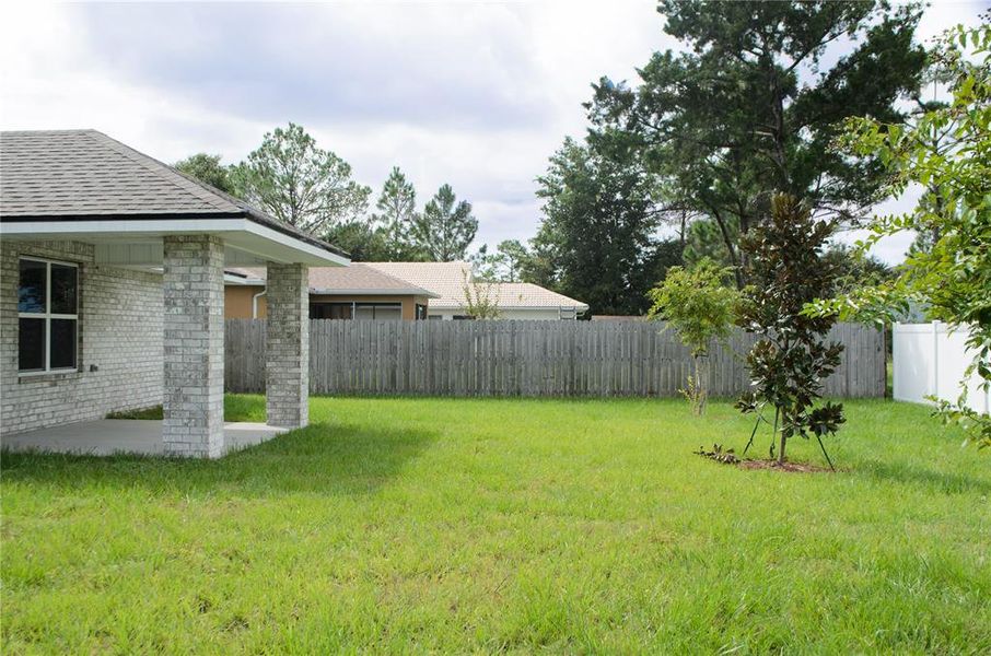 Exterior details and patio area of a home in Palm Coast, Palm Coast (Image 3). Exterior details and patio area of a home in Palm Coast, Palm Coast (Image 3).