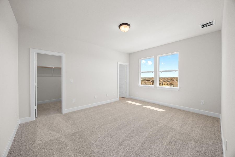 Spacious, unfurnished interior of a new home in Rough Hollow - Las Brisas, Austin (Image 21).