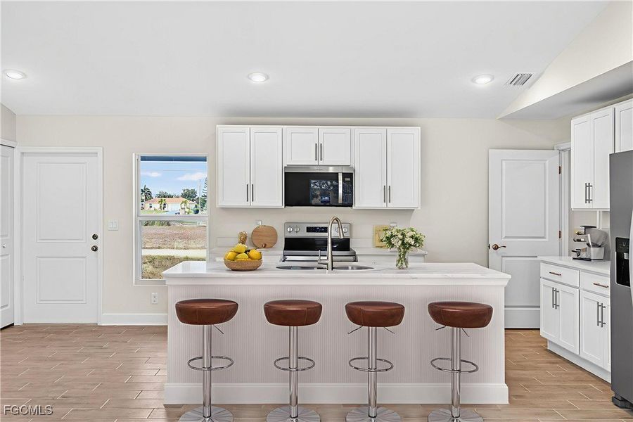 Furnished interior view inside a new home in Cape Coral, Cape Coral (Image 7). Furnished interior view inside a new home in Cape Coral, Cape Coral (Image 7).