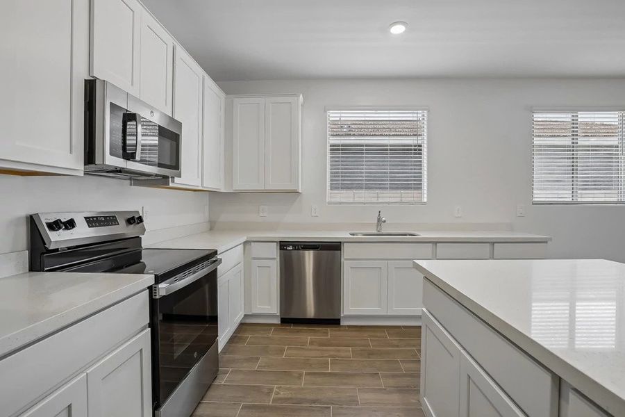 Kitchen. Representative images and renderings are for illustrative purposes. Actual structural options and design finishes of home may vary.
