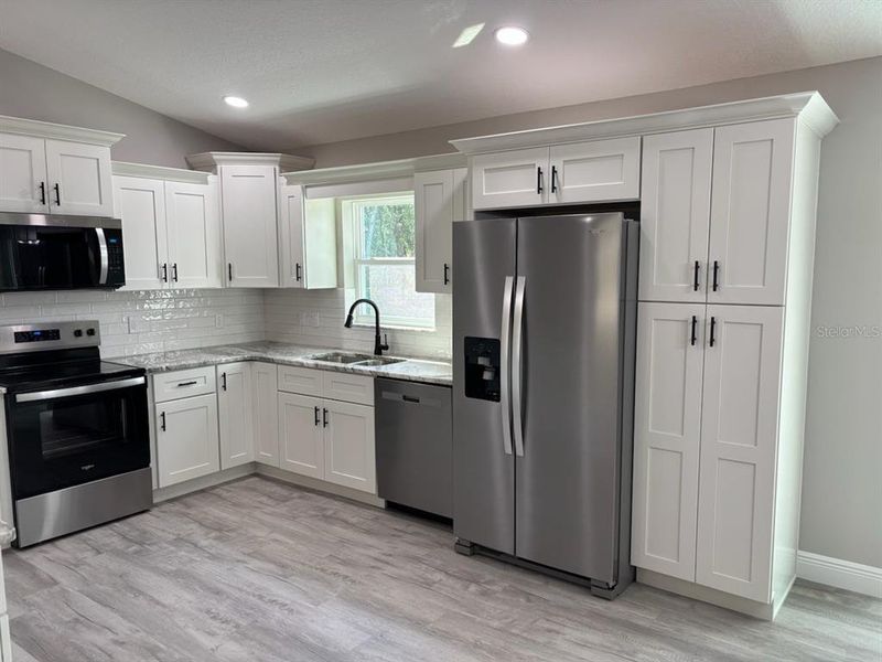 Furnished interior view inside a new home in , Citrus Springs (Image 13).