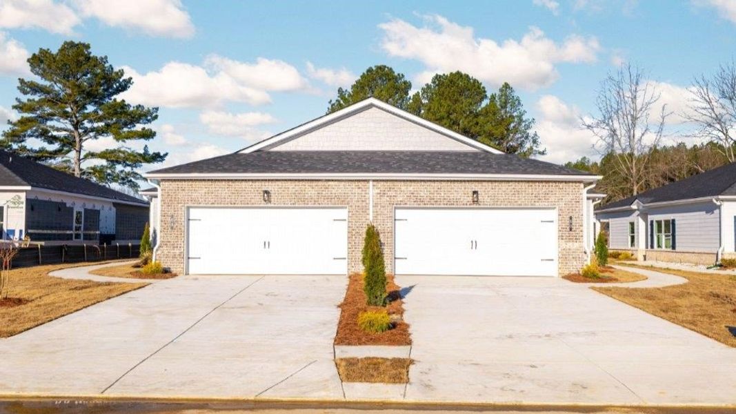 Front exterior of a new home in Cambridge Cove, Chickamauga, GA, highlighting curb appeal (Image 2).