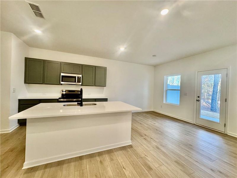 Furnished interior view inside a new home in Eastlyn Crossing, Flowery Branch (Image 8). Furnished interior view inside a new home in Eastlyn Crossing, Flowery Branch (Image 8).