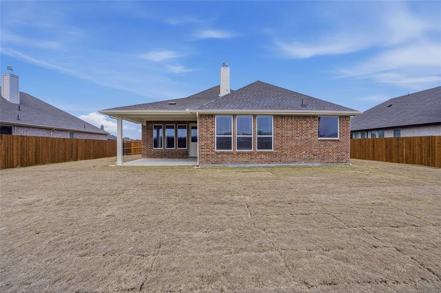 Exterior details and patio area of a home in Aero Vista, Caddo Mills (Image 3).