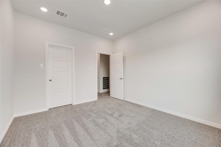 Spacious, unfurnished interior of a new home in Valencia On The Lake, Little Elm (Image 30). Spacious, unfurnished interior of a new home in Valencia On The Lake, Little Elm (Image 30).