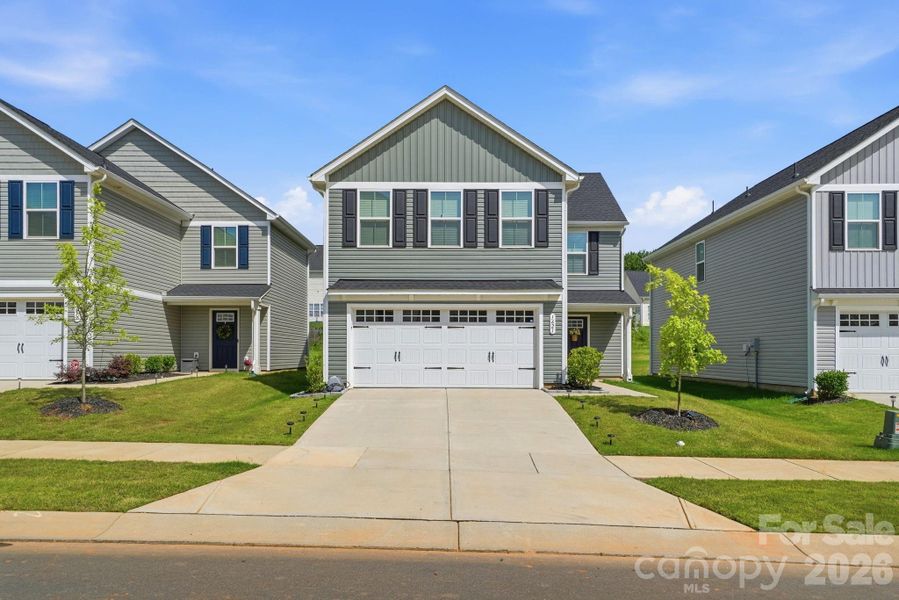 Front exterior of a new home in , Charlotte, NC, highlighting curb appeal (Image 2). Front exterior of a new home in , Charlotte, NC, highlighting curb appeal (Image 2).