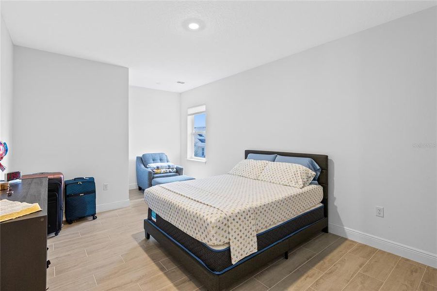 Furnished interior view inside a new home in Laureate Park, Orlando (Image 36).