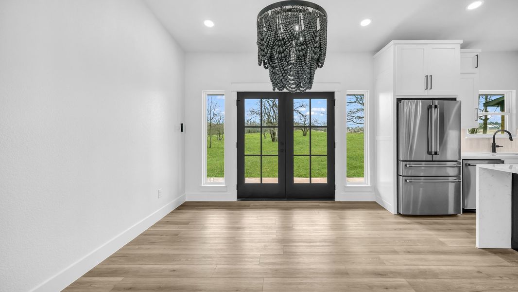 Representative unfurnished interior of a home built from the Zephyer 2 by Zeal Home Builders in Parallel Pastures, Poolville (Image 17).