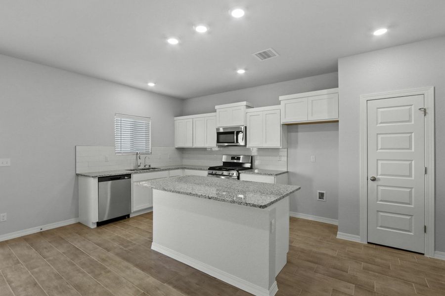 Furnished interior view inside a new home in Paseos Del Este, Horizon City (Image 3).