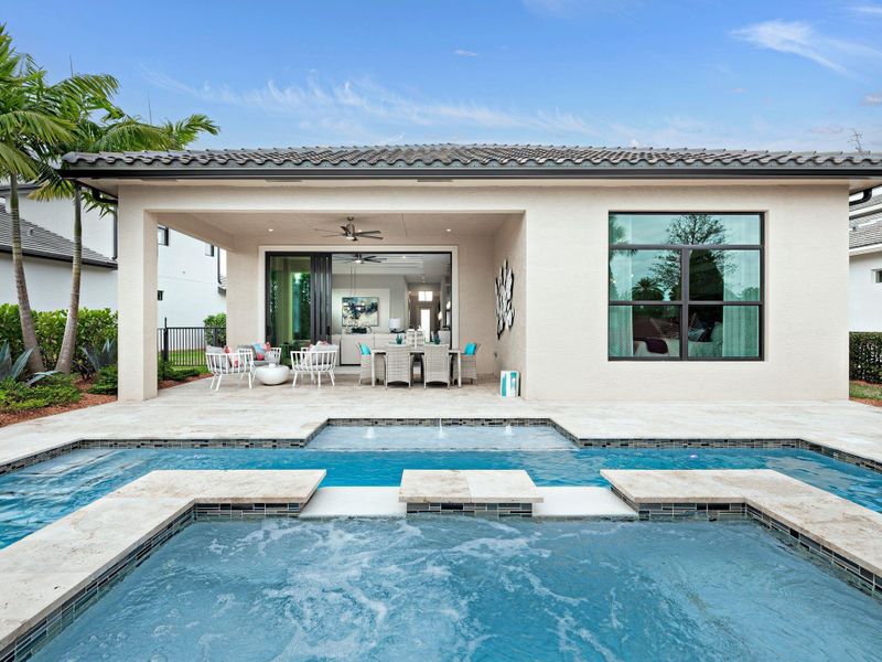 Exterior details and patio area of a home in PGA Village Verano, Port St. Lucie (Image 4).