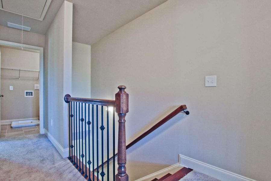 Representative unfurnished interior of a home built from the Barwick by KM Homes in Nickel Creek at Newnan Crossing, Newnan (Image 23).