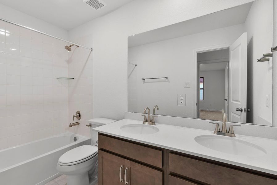 Furnished interior view inside a new home in Cedar Pointe, Crosby (Image 8).