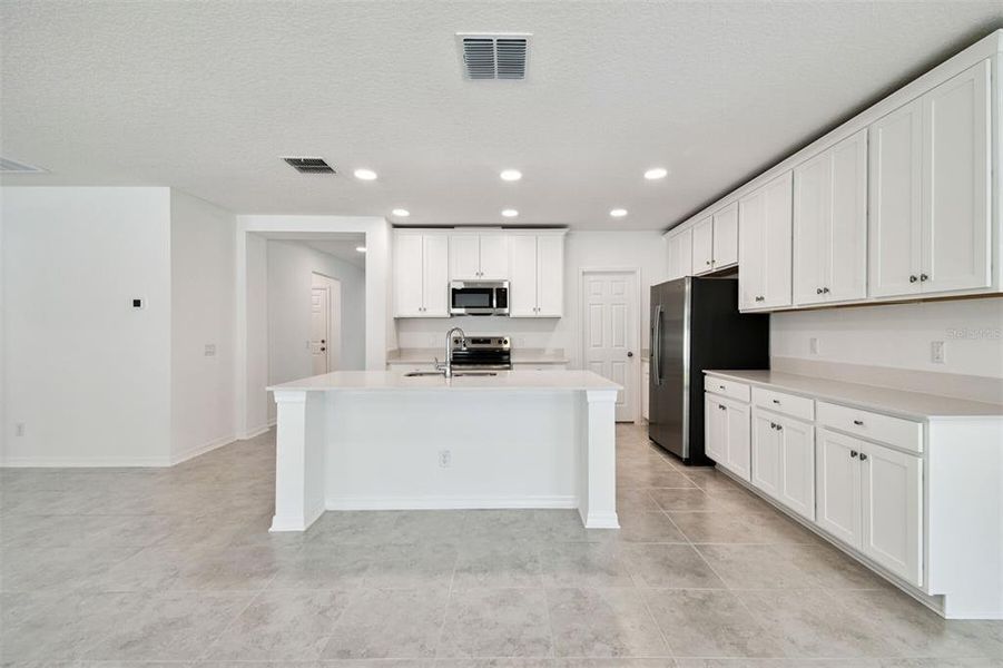 Furnished interior view inside a new home in Meadow Oaks, Hudson (Image 6).