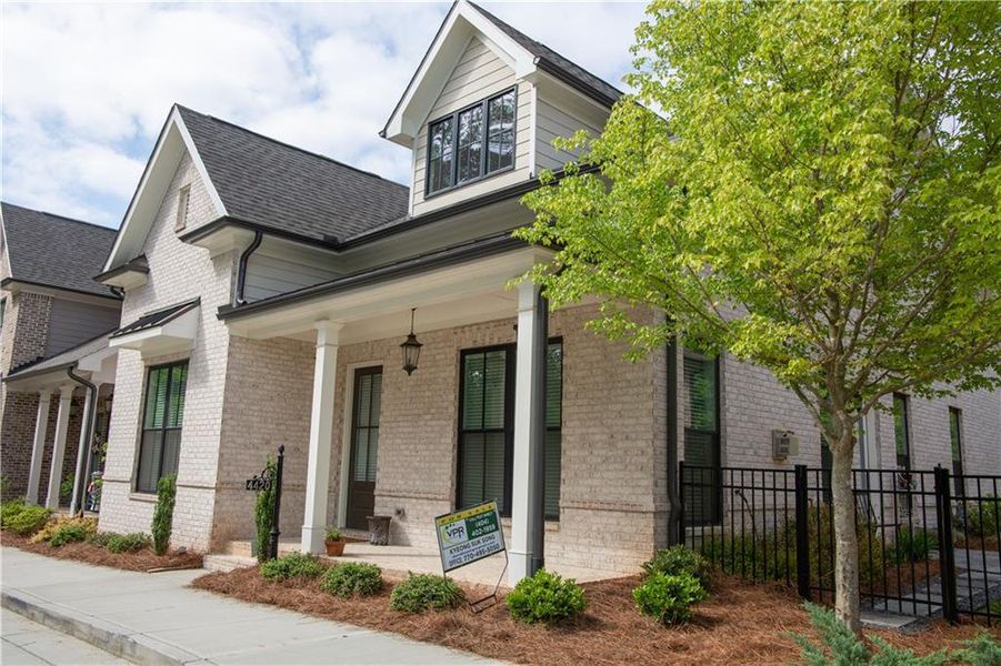 Front exterior of a new home in , Peachtree Corners, GA, highlighting curb appeal (Image 23).