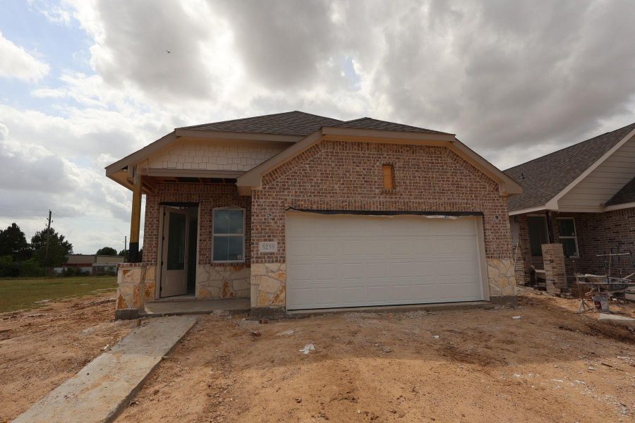 Two story home with 5 beds, 3 baths, and 2 car garage.