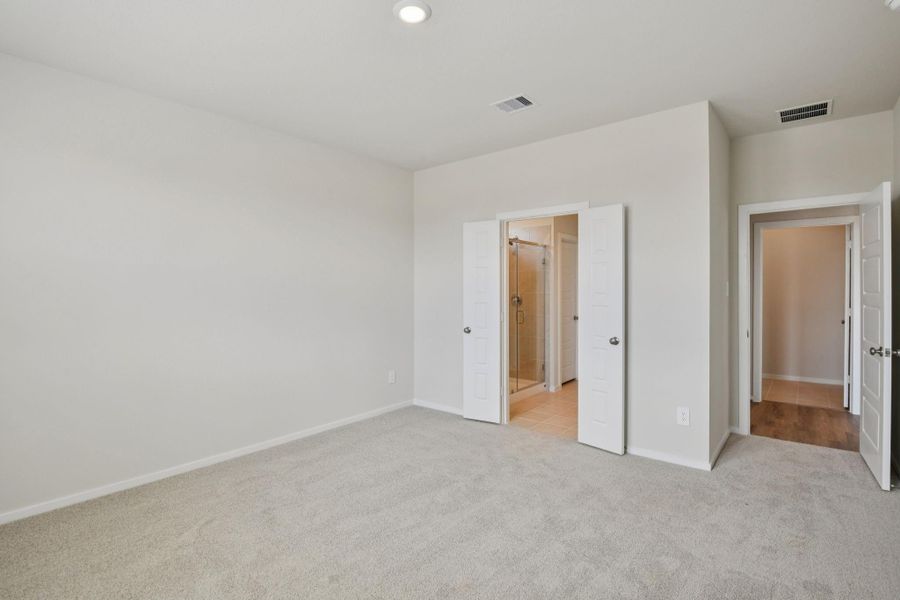 Spacious, unfurnished interior of a new home in Sanford Farms - Traditional Series, Waller (Image 23).