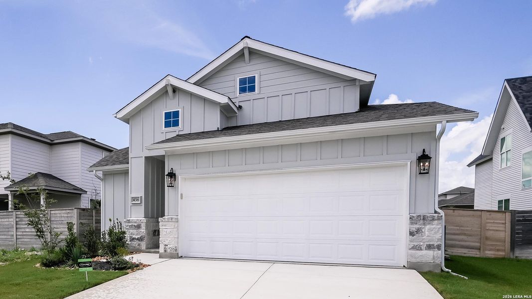 Front exterior of a new home in Solms Landing, New Braunfels, TX, highlighting curb appeal (Image 20).