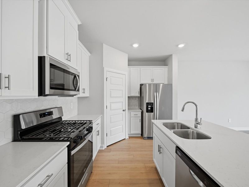 Furnished interior view inside a new home in Crossing at Abner Creek Townes, Greer (Image 7).