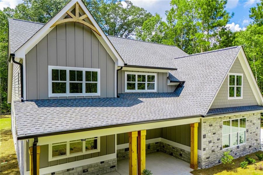 Front exterior of a new home in , Douglasville, GA, highlighting curb appeal (Image 1).