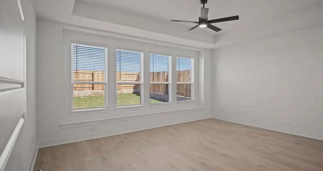 Representative unfurnished interior of a home built from the Farris by Chesmar Homes in Gregg Ranch, Marble Falls (Image 12).