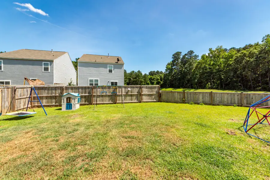 Exterior details and patio area of a home in , Summerville (Image 24). Exterior details and patio area of a home in , Summerville (Image 24).