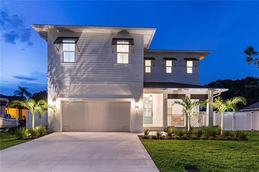 Front exterior of a new home in , Tampa, FL, highlighting curb appeal (Image 33). Front exterior of a new home in , Tampa, FL, highlighting curb appeal (Image 33).