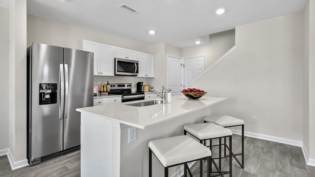 Furnished interior view inside a new home in North Village Townes, Greensboro (Image 8).