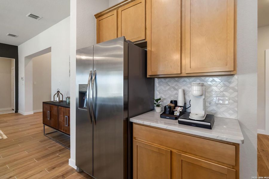 Furnished interior view inside a new home in Alamo Estates, San Antonio (Image 15).